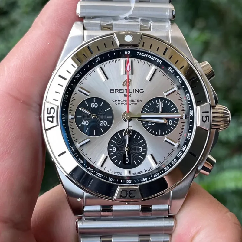 Breitling Chronomat AB0134101K1A1 Replica - Cadran Argent Lunette Cannelee